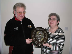 Roger Kneale receiving trophy